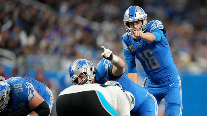 Detroit Lions QB Jared Goff calls a play at the line against the Carolina Panthers at Ford Field in Detroit, Michigan.