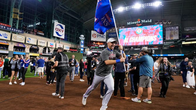 Texas Rangers celebrates punching their ticket to the 2023 World Series after defeating the Astros in the ALCS at Minute Maid Park in Houston, Texas.