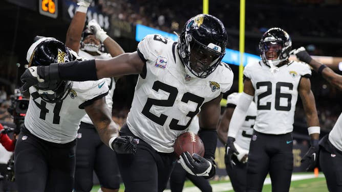 Jaguars LB Foyesade Oluokun celebrates with teammates after returning an interception for a TD vs. the Saints at Caesars Superdome in New Orleans.