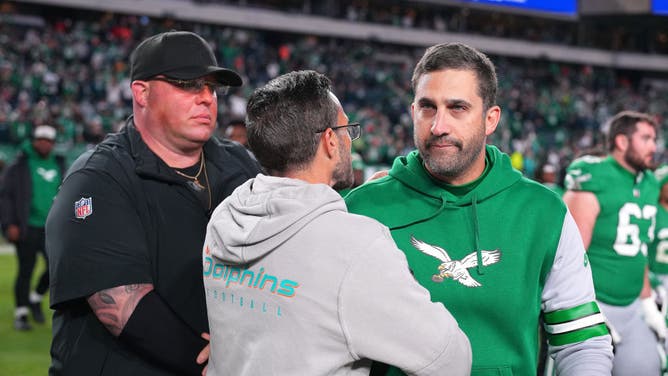 Eagles coach Nick Sirianni greets Dolphins coach Mike McDaniel after a victory