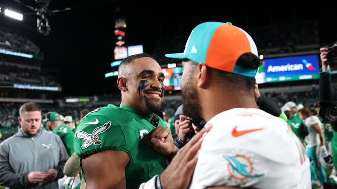 Former Alabama teammates Tua Tagovailoa of the Dolphins and Jalen Hurts of the Dolphins.