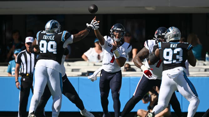 Houston Texans QB C.J. Stroud throws a pass against the Panthers at Bank of America Stadium in Charlotte, North Carolina.