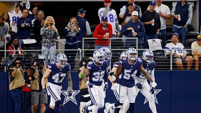 Dallas Cowboys players celebrate a safety after a blocked punt in the first half of a game against the Los Angeles Rams that helped lead to a Scorigami in the NFL.