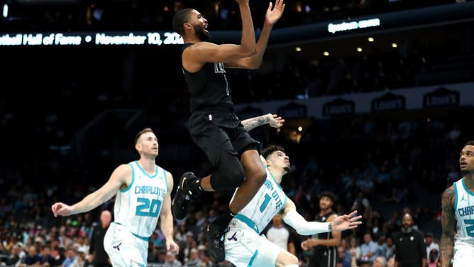 Brooklyn Nets SF Mikal Bridges shoots a floater against the Hornets at Spectrum Center in Charlotte, North Carolina.