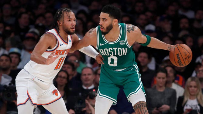 Boston Celtics wing Jayson Tatum backs down New York Knicks PG Jalen Brunson at Madison Square Garden.