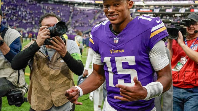 Minnesota Vikings quarterback Joshua Dobbs is all smiles as he leaves the field after a win over the New Orleans Saints.