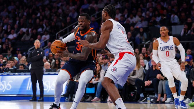 New York Knicks forward Julius Randle attacks the paint on Los Angeles Clippers wing Kawhi Leonard at Madison Square Garden.