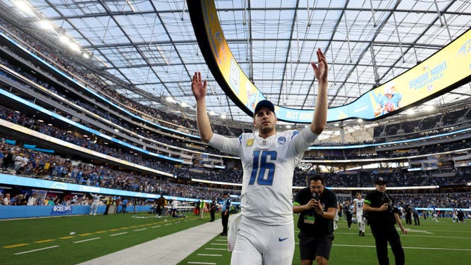 Jared Goff of the Detroit Lions celebrates as he walks off the field after beating the Los Angeles Chargers.
