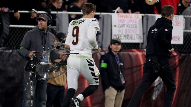 Joe Burrow of the Cincinnati Bengals heads to the locker room after injuring his wrist during Thursday Night Football against the Baltimore Ravens.