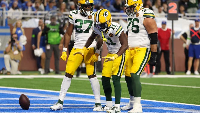 Jayden Reed of the Green Bay Packers celebrates a touchdown less than three minutes into the first Thanksgiving Day NFL game against the Detroit Lions.