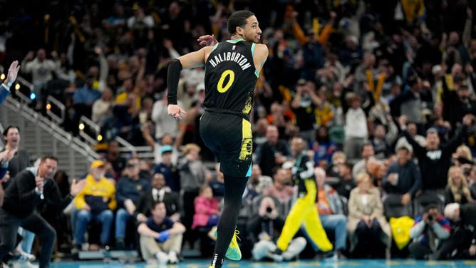 Pacers PG Tyrese Haliburton skips down the court after a made 3-pointer in an NBA In-Season Tournament game vs. the Detroit Pistons at Gainbridge Fieldhouse in Indianapolis.