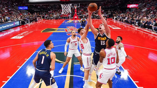 Denver Nuggets big Nikola Jokic attempts the shot vs. the Rockets during an NBA In-Season Tournament game at Toyota Center in Houston, Texas.