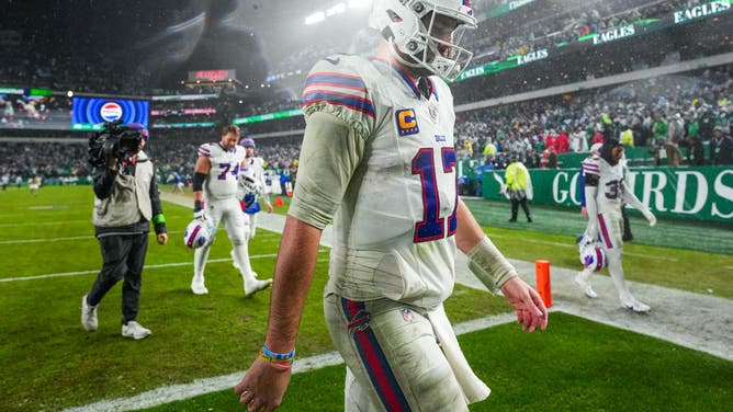 Bills quarterback Josh Allen walks away from an overtime loss to the Eagles