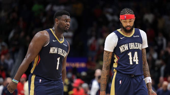 Pelicans All-Stars Zion Williamson and Brandon Ingram strategize during a game vs. the Sacramento Kings at the Smoothie King Center in New Orleans.