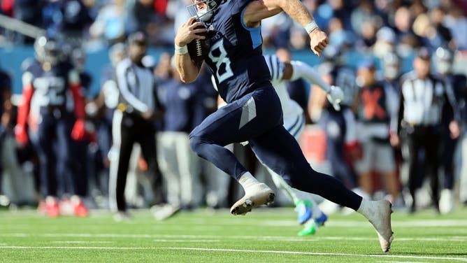 Will Levis of the Tennessee Titans carries the ball against the Indianapolis Colts during the first half.