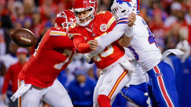 Von Miller of the Buffalo Bills hits Patrick Mahomes of the Kansas City Chiefs to force an incomplete pass during the second half of the game at GEHA Field.