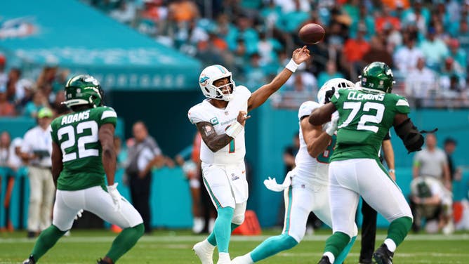 Dolphins QB Tua Tagovailoa throws a pass vs. the New York Jets in an NFL Week 15 game at Hard Rock Stadium in Miami, Florida.
