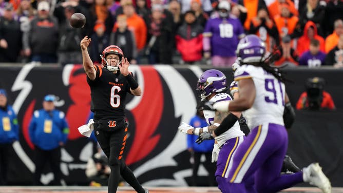 Bengals QB Jake Browning throws the ball on the run in overtime vs. the Minnesota Vikings at Paycor Stadium in Cincinnati, Ohio.