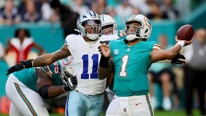 Dolphins quarterback Tua Tagovailoa passes the football against the Cowboys