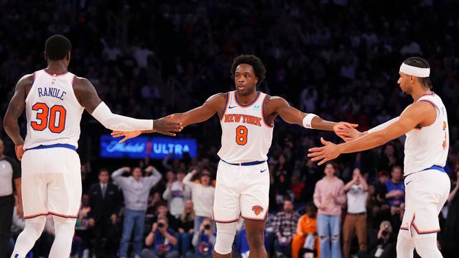 New York forward OG Anunoby high-fives Knicks forwards Julius Randle and Josh Hart at Madison Square Garden.