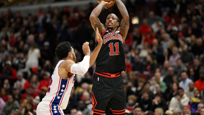 Bulls SF DeMar DeRozan shoots a fadeaway over Philadelphia 76ers SF Tobias Harris at the United Center in Chicago.