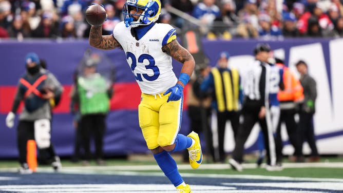 Kyren Williams #23 of the Los Angeles Rams celebrates after a rushing touchdown during the first quarter against the New York Giants at MetLife Stadium.