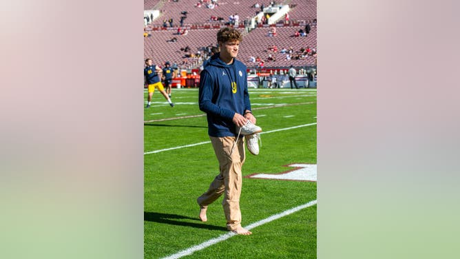 J.J. McCarthy of the Michigan Wolverines walks off the field before the CFP Semifinal Rose Bowl Game against the Alabama Crimson Tide at Rose Bowl Stadium on January 01, 2024 in Pasadena, California.