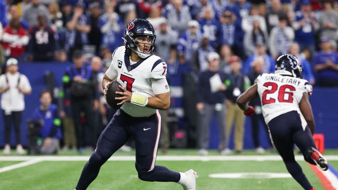 Houston Texans QB C.J. Stroud drops back to pass against the Colts in NFL Week 18 at Lucas Oil Stadium in Indianapolis, Indiana.