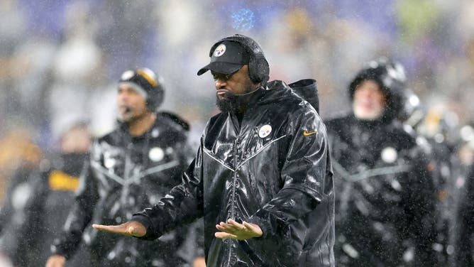 Pittsburgh Steelers head coach Mike Tomlin calms his team down from the sidelines during the Ravens game at M&T Bank Stadium in Baltimore, Maryland.