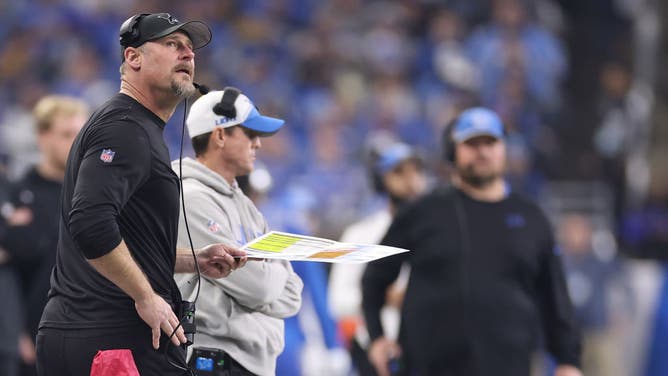 Head coach Dan Campbell of the Detroit Lions looks up at the video board during a Divisional Playoff game against the Tampa Bay Buccaneers at Ford Field.