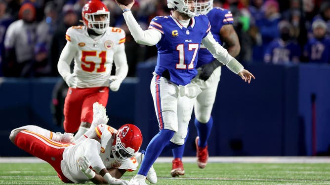 Josh Allen of the Buffalo Bills looks to throw a pass against the Kansas City Chiefs during the AFC Divisional Playoff game at Highmark Stadium.