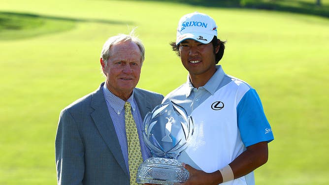 Hideki Matsuyama and Jack Nicklaus pose with the trophy after the Memorial Tournament presented by Nationwide Insurance at Muirfield.