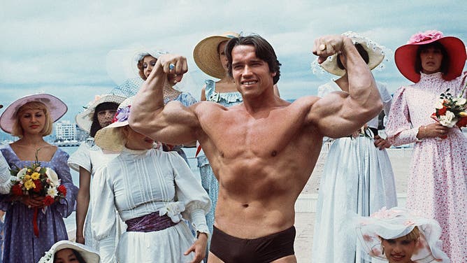 Schwarzenegger during the 38th Cannes Film Festival where his Pumping Iron documentary aired.