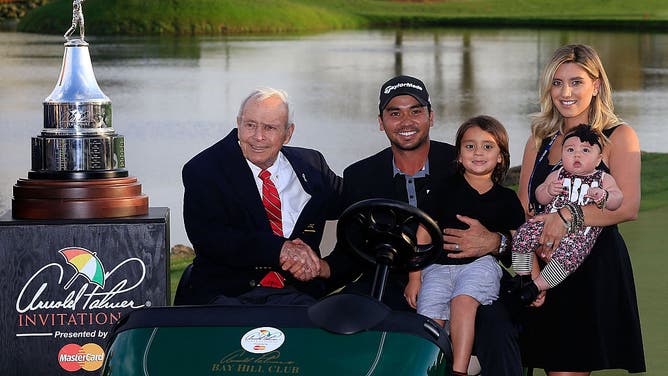 Arnold Palmer poses with Jason Day, Day's wife Ellie and children Dash and Lucy following the final round of the Arnold Palmer Invitational at Bay Hill Club and Lodge in Orlando, Florida.