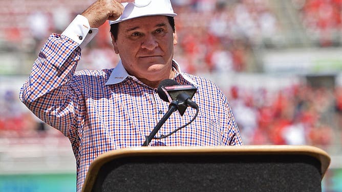 Former Cincinnati Reds player and Major League Baseball all-time hits leader Pete Rose speaks during his induction in to the Reds Hall of Fame.