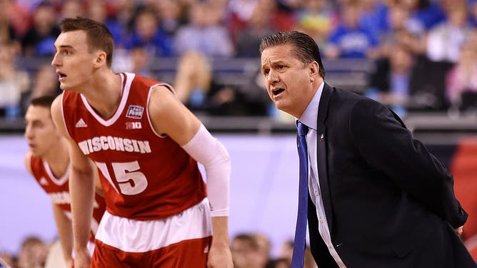 Kentucky Head Coach John Calipari yells instructions to his team during a NCAA Final Four game between the Wisconsin Badgers and the Kentucky Wildcats.
