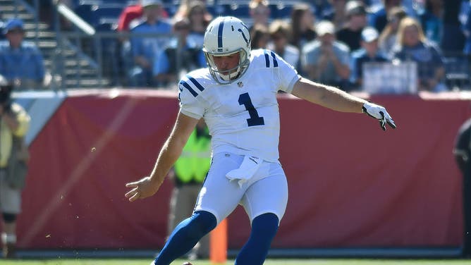 Indianapolis Colts punter Pat McAfee kicking off during a game between the Indianapolis Colts and the Tennessee Titans.