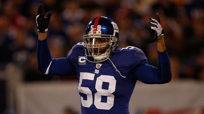 Before he coached the Raiders, Antonio Pierce played for the Giants and Redsins.