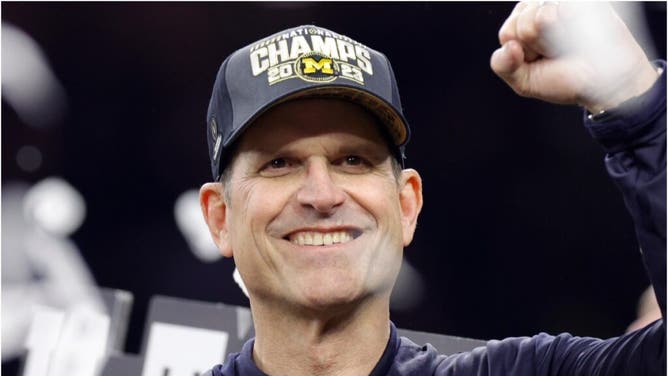 Jim Harbaugh gifts Rose Bowl game ball to baby battling cancer. (Credit: Getty Images)