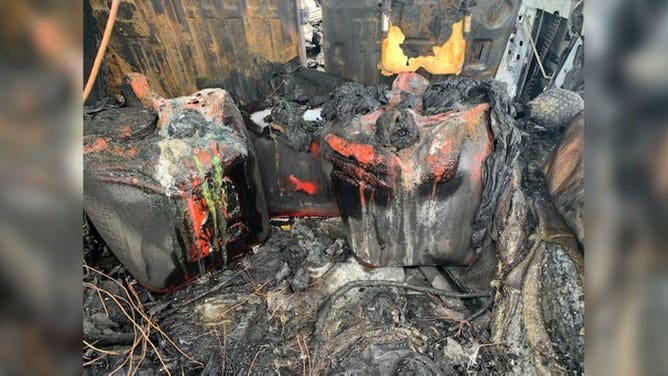Hummer gasoline container fire