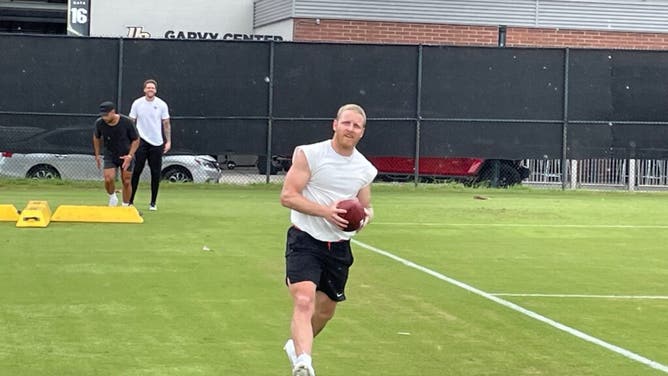 Cole Beasley works out in Orlando.