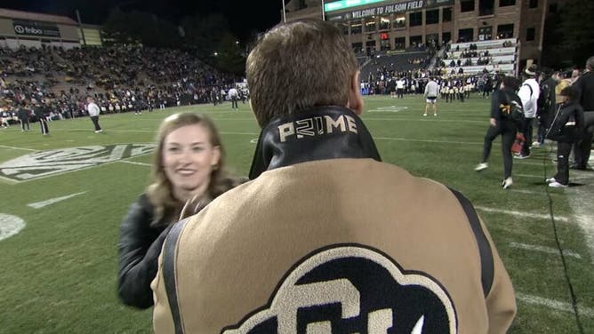 Colorado AD Rick George Shows Off His New Deion Sanders Jacket, during Friday's game against Stanford. 

Courtesy of Colorado Athletics