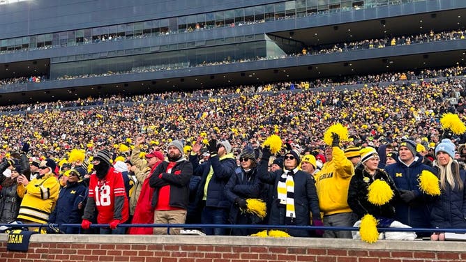 Michigan Fans celebrate the win over Ohio State on Saturday