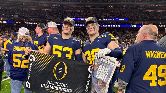 Michigan plauers celebrate the national championship win over Washington