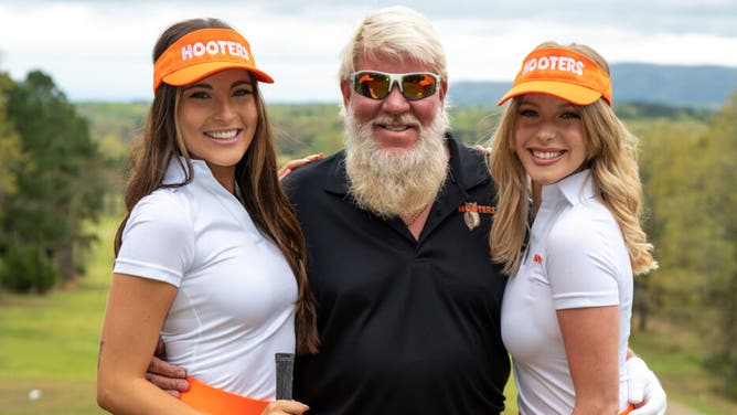 American golfing icon John Daly turns heads at The Open AGAIN as he plays  wearing Hooters pants and smokes cigarettes on the tee (but sadly he's a  woeful 143rd on the leaderboard!)