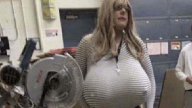 School board where trans teacher wears huge fake breasts will
