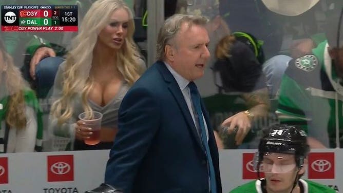 Who was the lady behind the Stars bench