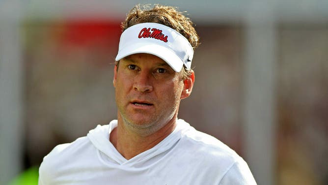 Ole Miss football coach Lane Kiffin reportedly tells players he's not leaving. (Photo by Justin Ford/Getty Images)