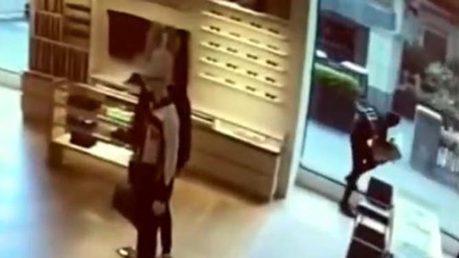 Louis Vuitton store retail crime ring thief knocked out