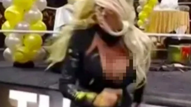 Maryse suffers a wardrobe malfunction while running away from The Miz's birthday party.